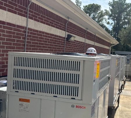 Professionals installing Bosch units