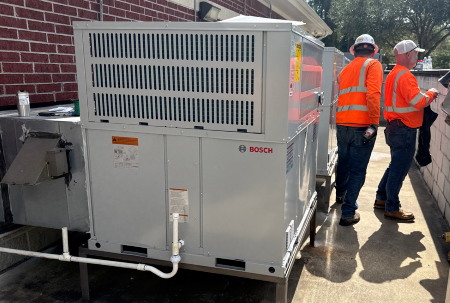 Professionals installing Bosch units