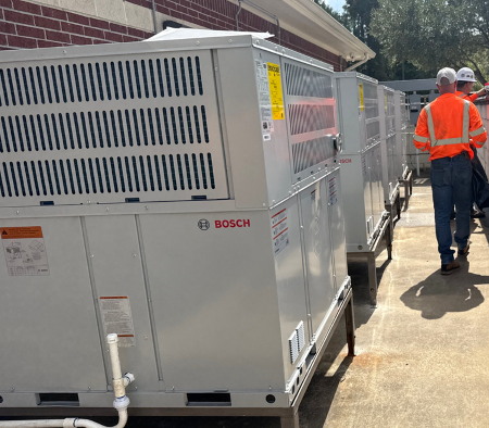 Professionals installing Bosch units